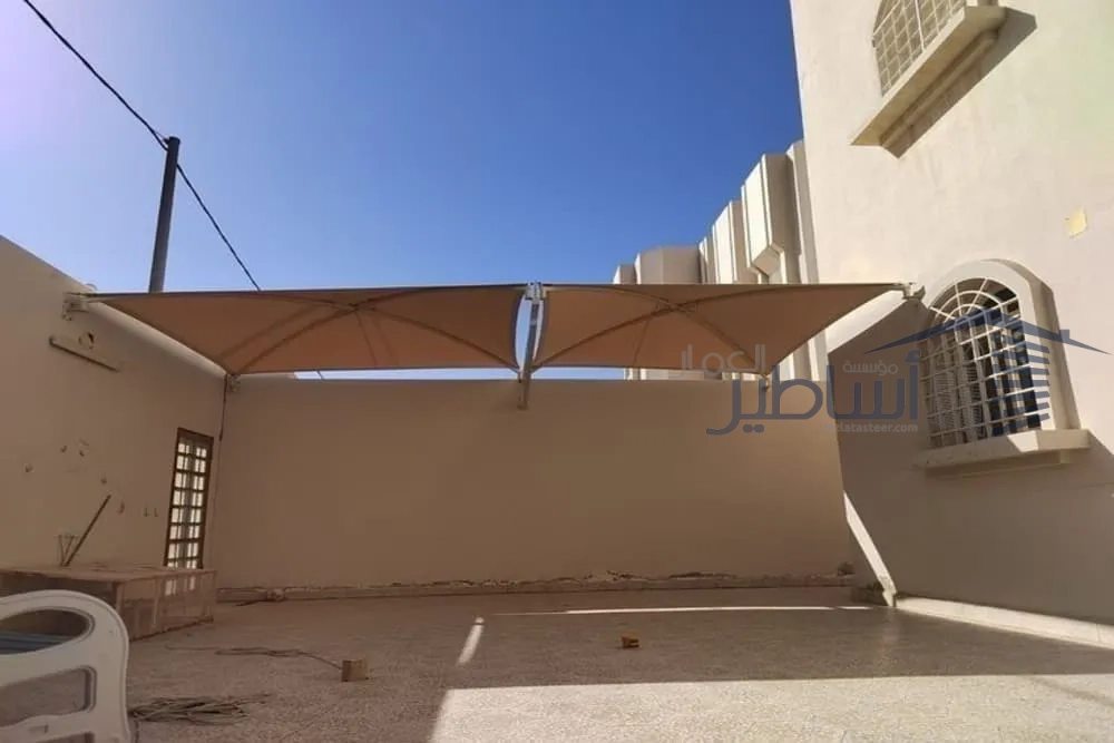 تركيب مظلات وسواتر في حي نجم الدين